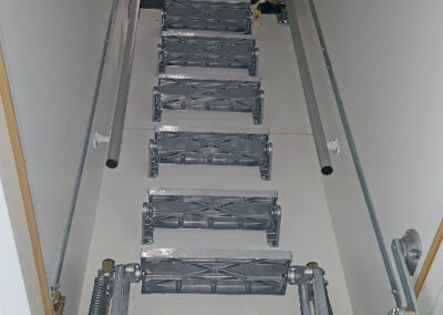 Supreme loft ladder with deep hatch. Shown with additional treads and grab rail