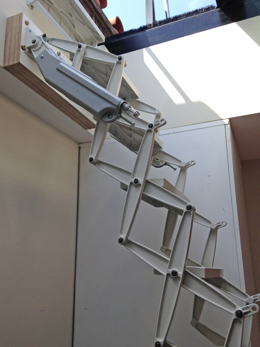 Skylight access loft ladder. Elite loft ladder from Premier Loft Ladders