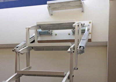 Elite loft ladder for access to rooflight. Grey white powder coat finish to match room colour