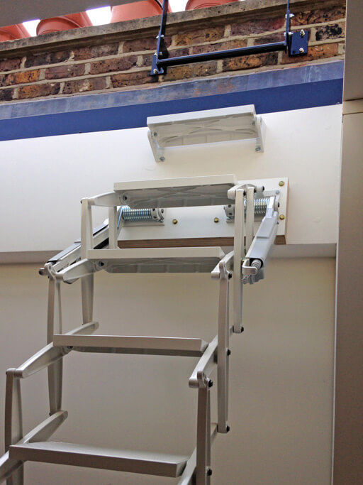 Elite loft ladder for access to rooflight. Grey white powder coat finish to match the decor. Elite loft ladder for access to rooflight. Grey white powder coat finish to match the decor.
