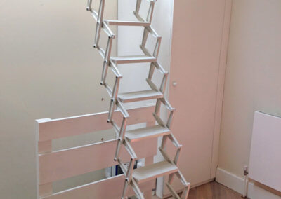 Elite concertina loft ladder for access to rooflight over staircase.