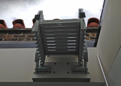 Elite space saving concertina loft ladder for access to rooflight. Premier Loft Ladders