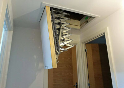Supreme loft ladder installed modern home. Hatch open. Sam Beardsley Carpentry