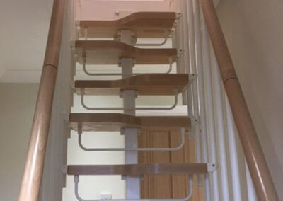 Compatta loft conversion staircase with safety riser bars. Premier Loft Ladders