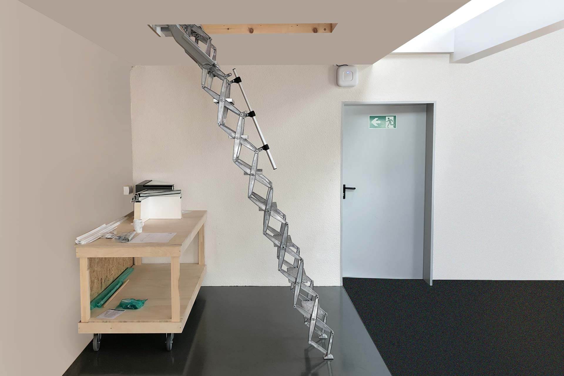 Elite Loft Ladder providing access to valuable storage space in a studio. Premier Loft Ladders