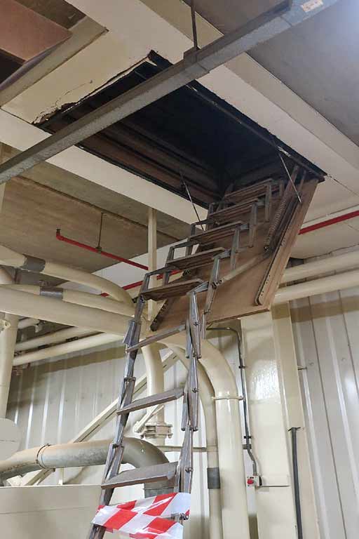 Broken retractable roof access ladder. Damaged after being hit. Broken retractable roof access ladder. Damaged after being hit.