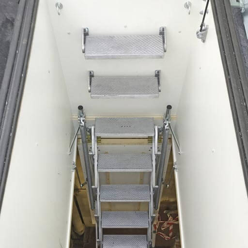 Retractable roof access ladder and hatch. Providing access for maintenance of roof top equipment. Premier Loft Ladders case study Retractable roof access ladder and hatch. Providing access for maintenance of roof top equipment. Premier Loft Ladders case study