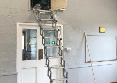 Elite Vertical installed into a wall aperture. Premier Loft Ladders