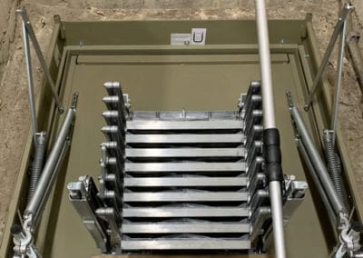 Elite heavy-duty retractable ladder fitted to steel hatch box