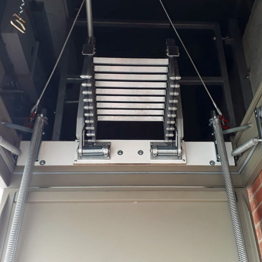 Elite concertina loft ladder fitted to steel hatch box Elite concertina loft ladder fitted to steel hatch box