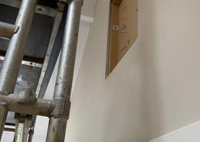 Artisan loft ladders preparing hole for vertical wall access ladder