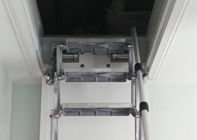 The Elite is installed above the existing loft hatch - Premier Loft Ladders case study