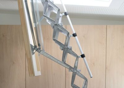 Sloped roof access hatch with heavy duty concertina ladder