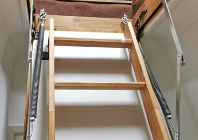 Spring hardware pack fitted to an existing loft ladder to replace broken springs
