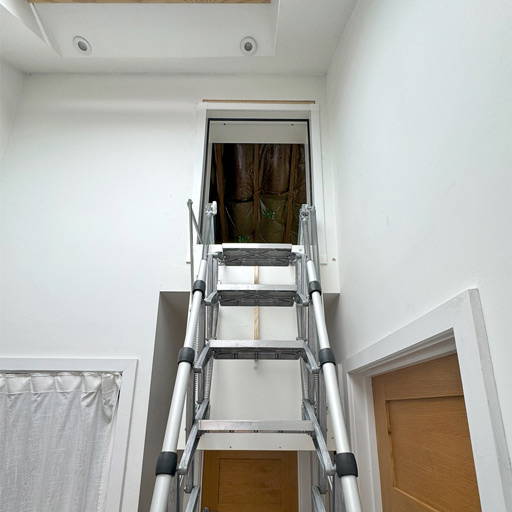 Easy to use wall access loft ladder in open position.