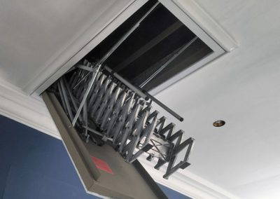 Fire-resistant electric ladder for high ceiling. Premier Loft Ladders case study