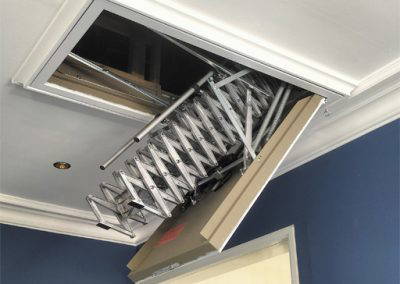 Fire-rated automatic loft hatch and ladder for high ceiling.